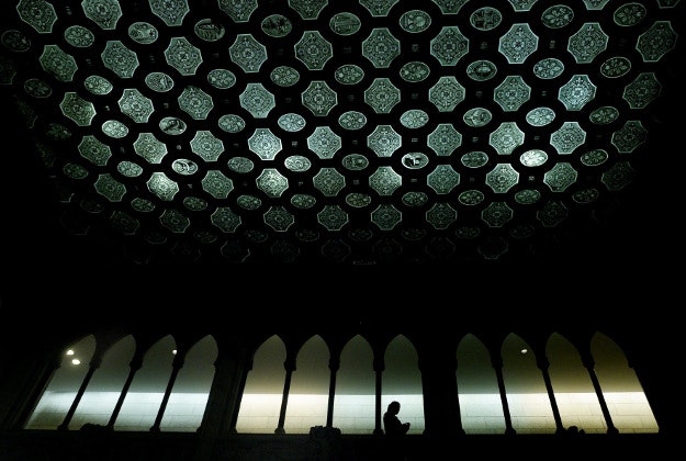 A person is silhouetted in the foyer of the House of Commons on Parliament Hill in Ottawa, Ontario, on Tuesday, Jan. 26, 2016. 