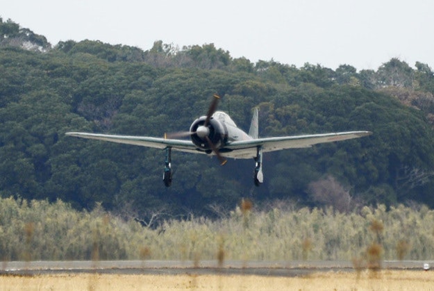 Mitsubishi’s legendary Zero fighter takes off for a test flight at an air station in Kanoya, Kagoshima prefecture, southern Japan, Wednesday, Jan. 27, 2016. The restored plane took to the skies over Japan on Wednesday for the first time since World War II. 