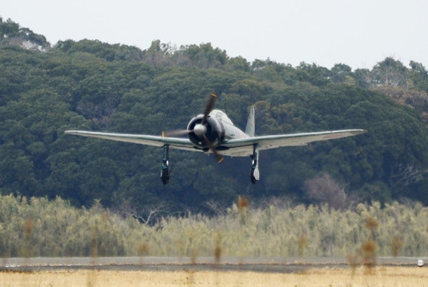 Mitsubishi’s legendary Zero fighter takes off for a test flight at an air station in Kanoya, Kagoshima prefecture, southern Japan, Wednesday, Jan. 27, 2016. The restored plane took to the skies over Japan on Wednesday for the first time since World War II.