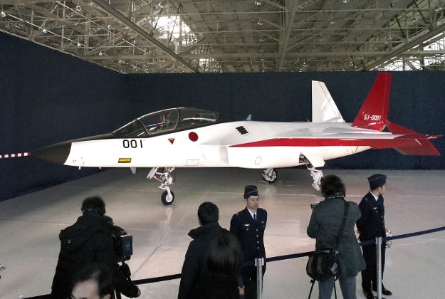 The first domestically-made stealth aircraft, X-2, is shown to the media at Nagoya Airport in Toyoyama town, central Japan, Thursday, Jan. 28, 2016. The demonstration plane is expected to make its maiden flight sometime after mid-February. A Defense Ministry official said the technology will give Japan the option of developing its own stealth fighter jets in the future.