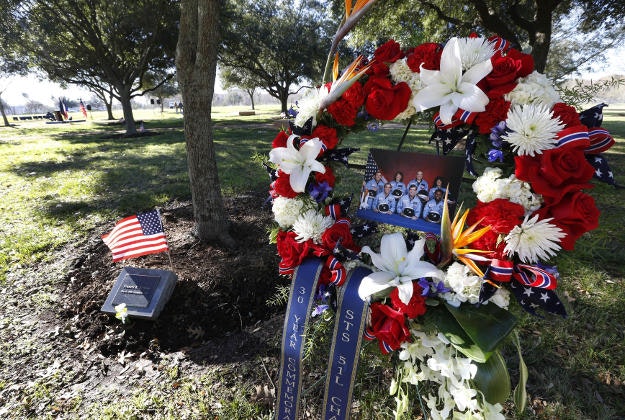A wreath in honor of the Challenger crew for the Day of Remembrance ceremony is placed at NASA's Lyndon B. Johnson Space Center in memorial grove honoring the Apollo, Challenger and Columbian crews Thursday, Jan. 28, 2016, in Houston.
