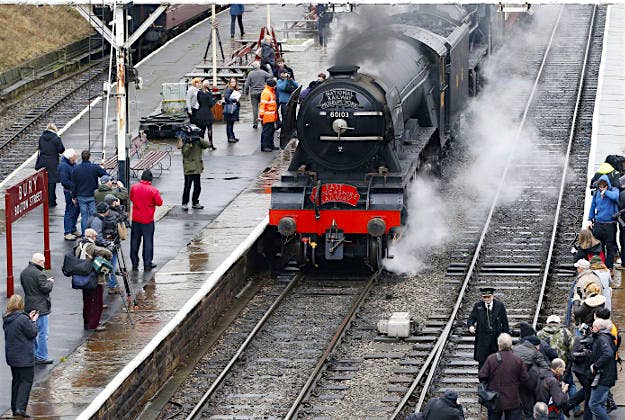 Travel News - new flying scotsman1 The Flying Scotsman locomotive under steam at the East Lancashire Railway tracks in public for the first time after the successful completion of a decade-long £4.2m restoration project.