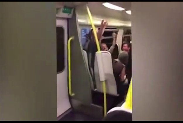 Travel News - train sing 1 Strangers burst into song on a train in Liverpool, England.