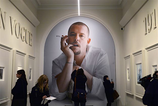 Travel News - 11137796-1 A large portrait of Alexander McQueen.