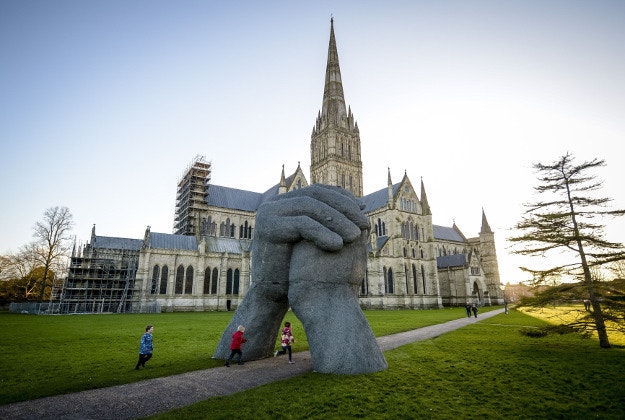 A sculpture made from galvanised wire, titled 'The Kiss', which is part of a new exhibition at Salisbury Cathedral called Relationships by artist Sophie Ryder. 
