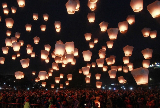 Hundreds of people release lanterns into the air in hopes of good fortune and prosperity at the traditional lantern festival during the Chinese New Year in the Pingxi district of New Taipei City, Taiwan, Monday, Feb. 22, 2016. The lantern festival starts 15 days after the Chinese Lunar New Year and falls on Feb. 22, this year. 