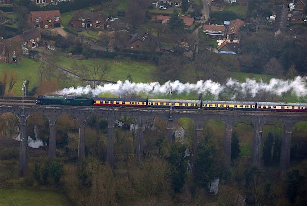 Travel News - flying scotsman london 4 An aerial view of the Flying Scotsman going over the Digswell Viaduct near Welwyn Garden City on its inaugural run from London to York after a decade long, £4.2 million refit.