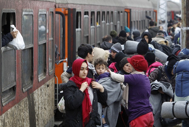 Refugees arrive by train to Tabanovce, Macedonia.