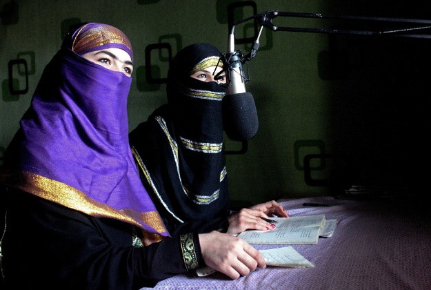 In this Friday, March 4, 2016 photo, broadcasters of Radio Shaesta prepare themselves to go on-air, in Kunduz, Afghanistan. Radio Shaesta -- Pashto for beauty -- had sought to educate women about their rights and address taboo subjects like reproductive health and domestic violence. 