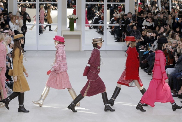 Models wear creations as part of Chanel's Fall-winter 2016-2017 ready to wear collection presented in Paris, France, Tuesday, March 8, 2016.