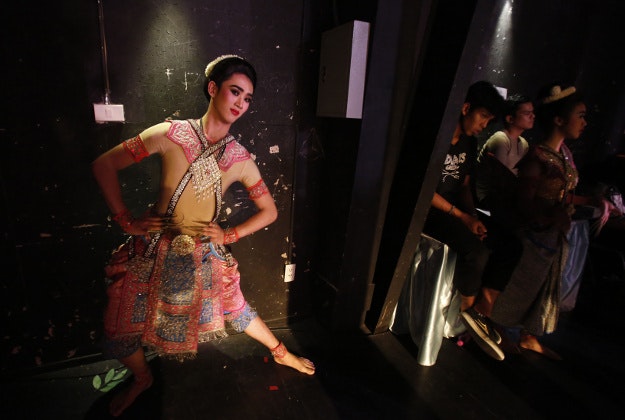 A Thai student actor warms up before a performance of Thai traditional Khon theater in Bangkok on Tuesday, March 22, 2016. Students at the Bunditpatanasilpa Institute are trained in traditional forms of drama, music and other arts in order to promote Thai culture. 