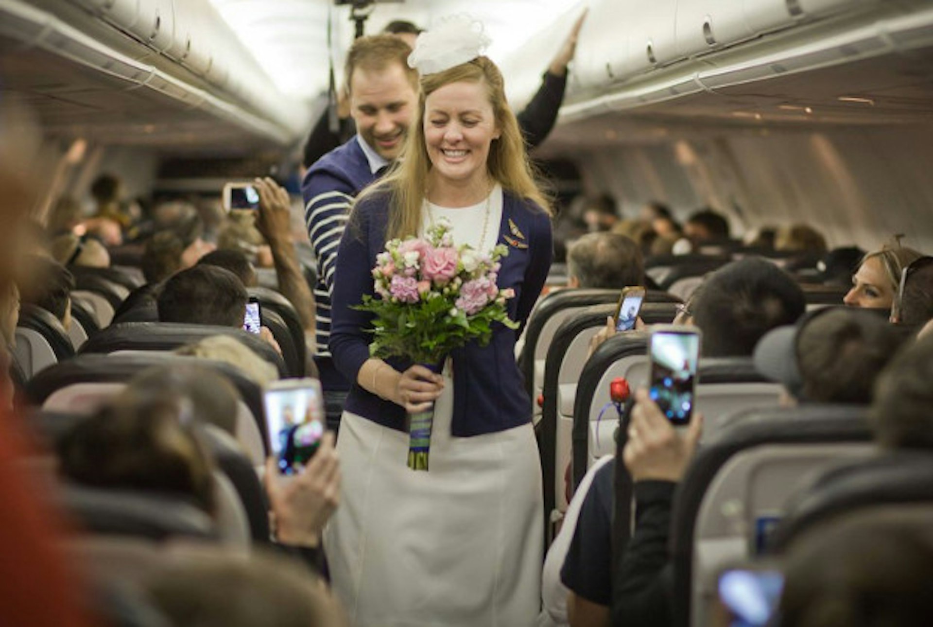 Kirsty and Jim exchanged vows on a packed plane.