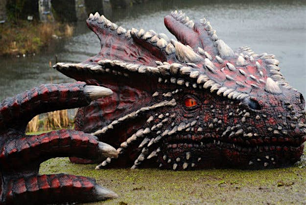 Travel News - Caerphilly-Dragon-Cadw-PA-Wire Handout photo issued by Cadw of a 13ft dragon art installation on the banks of Caerphilly castle, as a part of Wales' St David's Day celebrations. Image by Cadw/PA Wire.