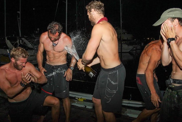  Oliver Bailey, Jason Fox, Mathew Bennett, Ross Johnson celebrating after they arrived in Trinidad. The British men have broken two world records and become the fastest crew to row the longest route across the Atlantic Ocean - despite capsizing three times.