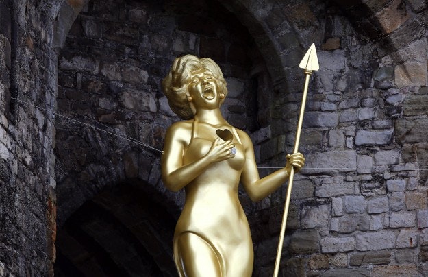 Welsh artist Marc Rees unveils his sculpture 'Bassey's Cry / Bloedd Bassey', a 20-foot tall likeness of Dame Shirley Bassey as Celtic Warrior Queen Boadicea at Caernarfon Castle in Wales, to launch the 'Get Creative' Weekend. 