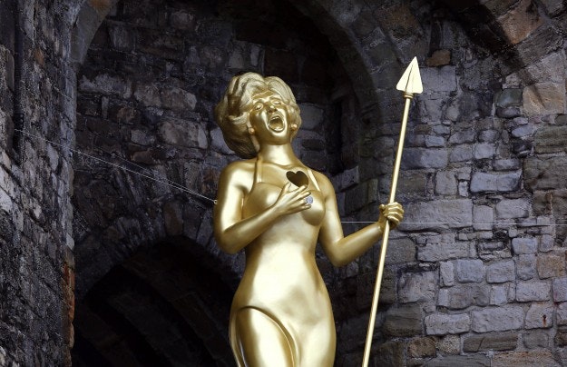 Welsh artist Marc Rees unveils his sculpture 'Bassey's Cry / Bloedd Bassey', a 20-foot tall likeness of Dame Shirley Bassey as Celtic Warrior Queen Boadicea at Caernarfon Castle in Wales, to launch the 'Get Creative' Weekend.