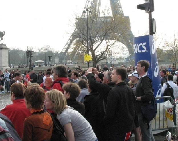 Crowds cheering on the runners in the Paris Marathon.