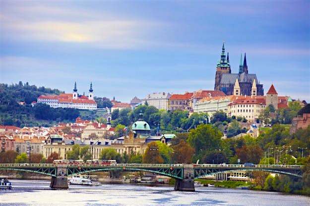Travel News - Overview of bridge crossing river. Overview of bridge crossing river in Prague.