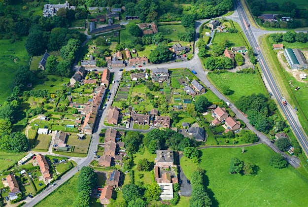 Travel News - Villageforsale West Heslerton Hall (top left) and West Heslerton village as part of a sale for the West Heslerton Estate, Malton, North Yorkshire with an estimate of £20 million, including its 21-bedroom mansion, 43 houses, a pub, a range of other buildings and more than 2,000 acres of farmland.