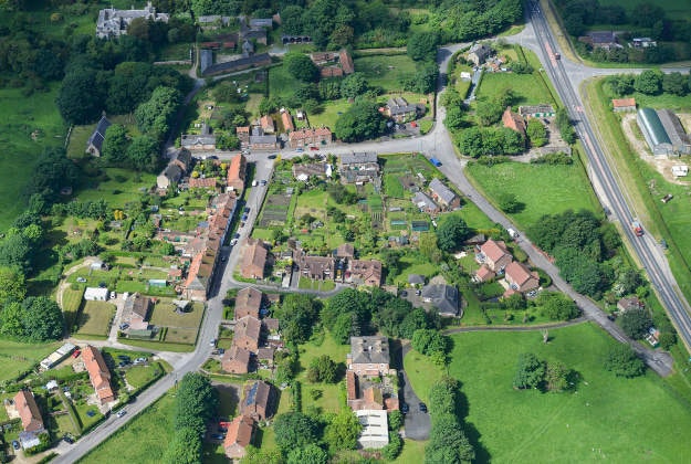 West Heslerton Hall (top left) and West Heslerton village as part of a sale for the West Heslerton Estate, Malton, North Yorkshire with an estimate of £20 million, including its 21-bedroom mansion, 43 houses, a pub, a range of other buildings and more than 2,000 acres of farmland. 
