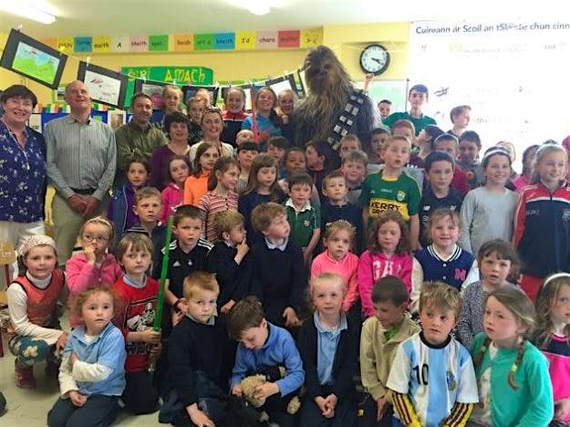 Travel News - 13255967_1282810475080815_6903503977570879300_n The 7 ft Wookie posed with the school children and teachers.