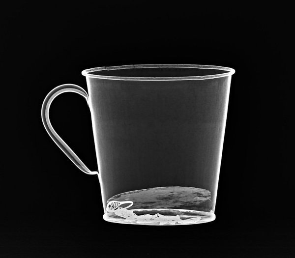 An x-ray of the mug showing the hidden jewellery. 