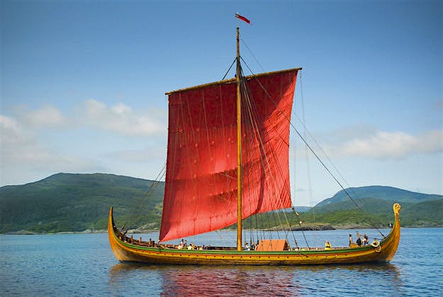Travel News - dra1 The Viking vessel sailing with Norwegian coast in the background