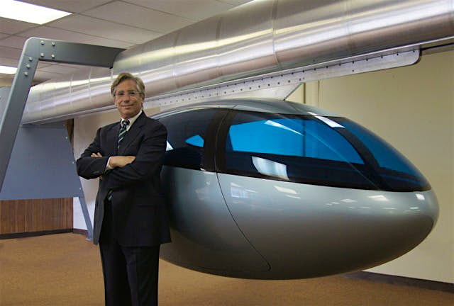 Travel News - jerry-sanders-ceo-skytran-11-HR Jerry Sanders, CEO of skyTran, with one of the new transport pods. Image: Miral/skyTran