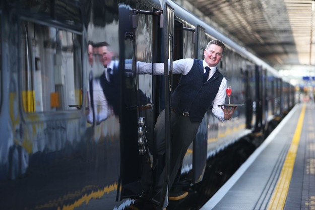 Mark Donegan waits for the first customers to arrive to board the Belmond Grand Hibernian.