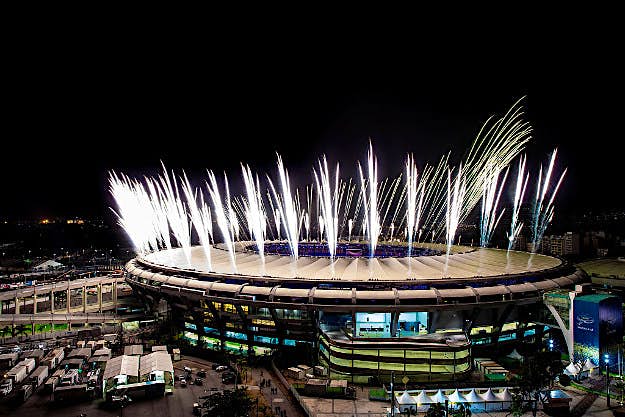 Travel News - GettyImages-585726978 Fireworks explode above the Maracana stadium during the rehearsal of the opening ceremony of the Olympic Games on 3 August.