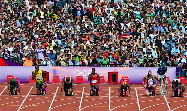 Travel News - Jamaica's Usain Bolt (2ndL) crosses hims Jamaica's Usain Bolt (2ndL) crosses hims