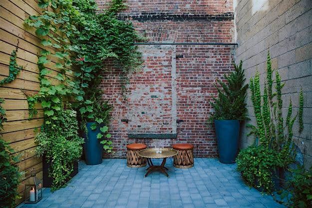 Travel News - Dobbin St Hidden Courtyard Credit- Amber Gress A hidden courtyard at the venue at Dobbin St in Williamsburg.