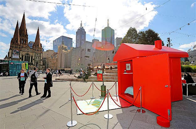 Travel News - GettyImages-599807682 McDonalds Monopoly Hotel is seen at Federation Square on September 7, 2016 in Melbourne, Australia. Built to celebrate the return of the Monopoly Game at Macca's, Australia's first real-life Macca's Monopoly Hotel has been brought to life in Melbourne overnight. Two of the nation's biggest Macca's fans, Laura Paton and Emma Kendrick were exclusive guests of the hotel, waking up to become the first major official prize winners of the Monopoly game at Macca's.