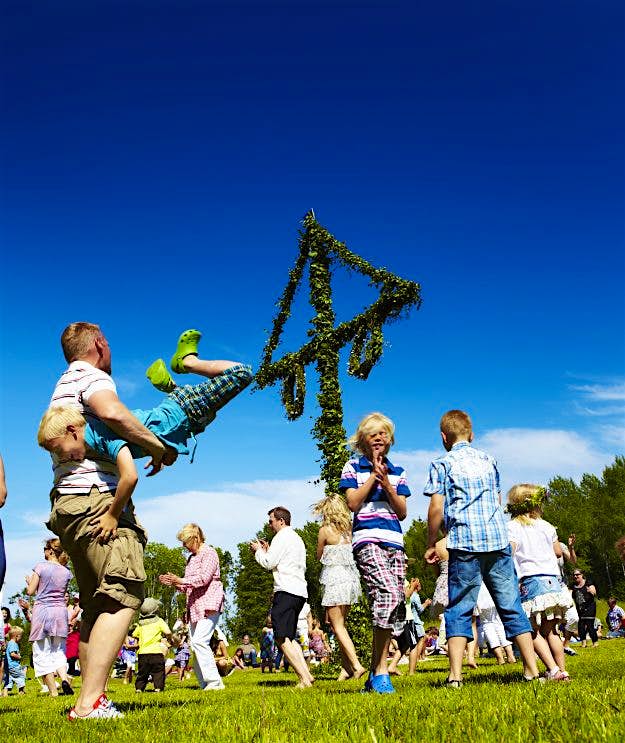 Travel News - People dancing around Midsummer pole. People dancing around Midsummer pole in Sweden. The country was named one of the best destinations for expats with children.