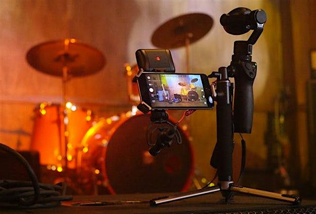 Travel News - The new Osmo mobile stick adjusts automatically to keep your smartphone steady. Image: DJI