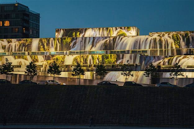 Travel News - studiovieta-com-waterfall-studiovieta_0471 A plain concrete Soviet building in Lithuania was transformed into a stunning piece of art. Image: Studio Vieta