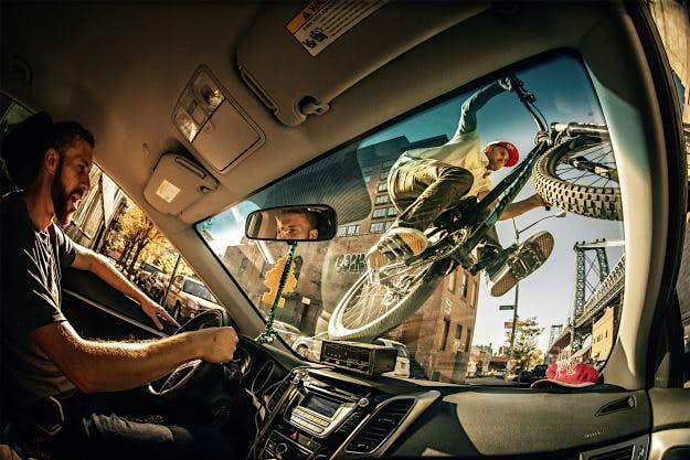 Travel News - ce16_005815_010875-media-mag The winning shot in the New Creativity category depicts Aaron Chase riding a bike on a cab in Brooklyn, New York.