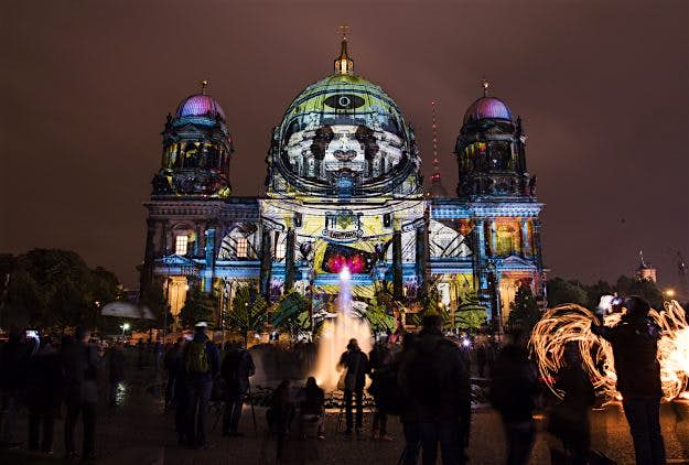 Travel News - GERMANY-ART-FESTIVAL-LANDMARK Colourful designs are projected on the facade of the Berlin Cathedral (Berliner Dom) as part of the yearly Festival of Lights in Berlin.