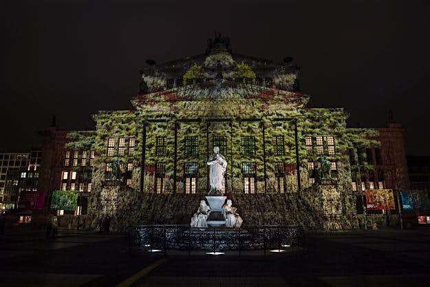Travel News - GERMANY-ART-FESTIVAL-LANDMARK Colourful designs projected on the facade of the Berlin Concert Hall (Konzerthaus) on the Gendarmenmarkt.