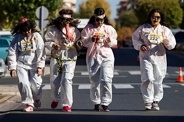 Travel News - SPAIN-NUCLEAR-ENERGY-ZOMBIE-RUN-HALLOWEEN People dressed up like zombies participate in the 'Nuclear Running Dead' race in the northern Spanish town of Miranda de Ebro