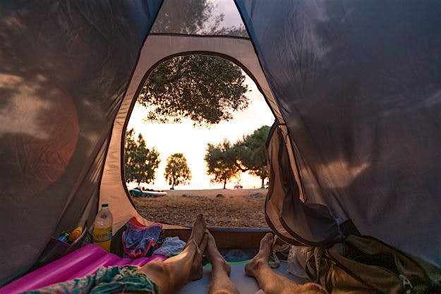 Travel News - sup-119 The couple brought a two-man tent for camping throughout the trip.