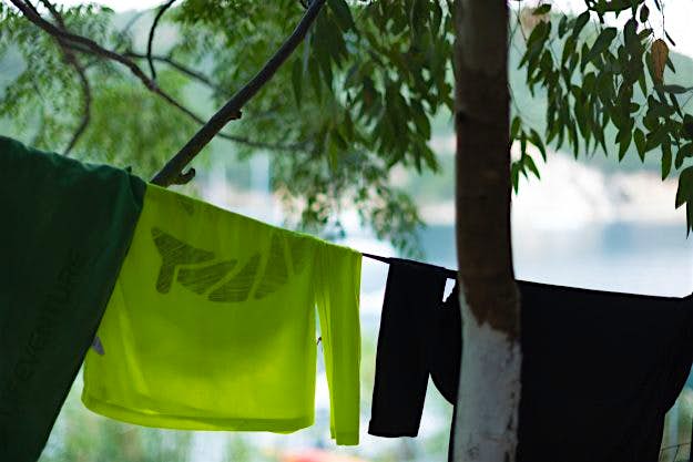 Travel News - sup-26 Bethany and Jay's clothes dry at camp.