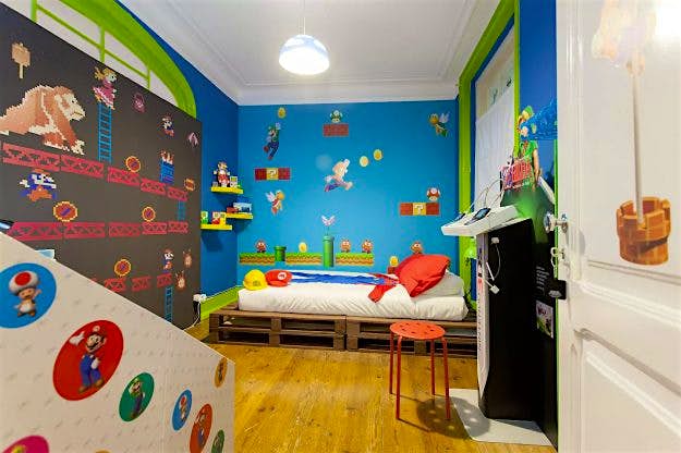 Travel News - super-mario-room The themed room is a gamer's paradise, with dedicated consoles to play on.