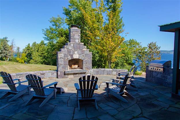 Travel News - 1 Cedar Island | South Hero, VT | Luxury Real Estate Cedar Island in Vermont is up for auction. Image: Concierge Auctions