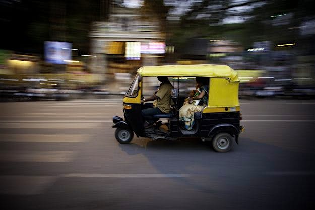 Travel News - Rickshaw Rickshaw at high speed on highway.