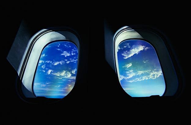 Travel News - Clouds, view through windows from aeroplane The relationship between seats and windows on an plane are not as imagined.