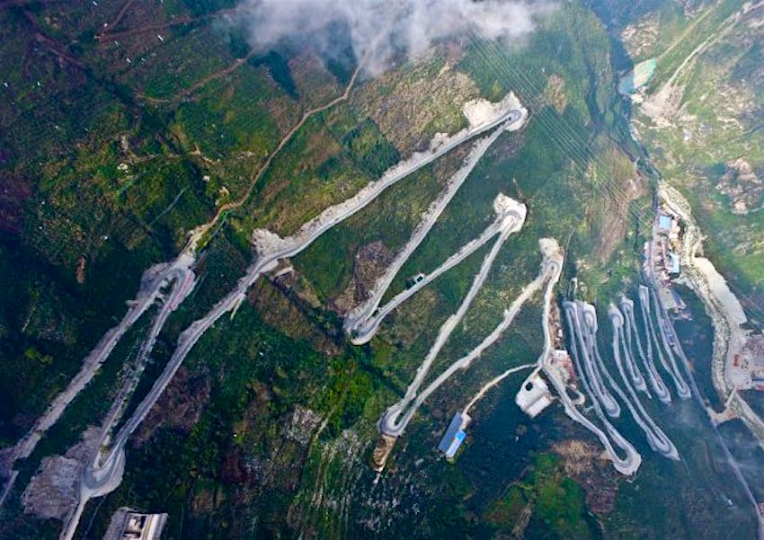 Travel News - # Imaginechina A road with 24 zigzag bends in southwest China. Image: ImagineChina