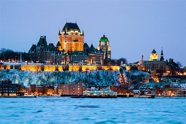 Travel News - GettyRF_548633225 Quebec city skyline in winter. Canada cheap flights