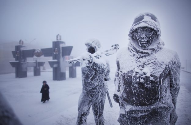 Ice crusted statues in a park commemorating the fallen of WWII in Yakutsk.