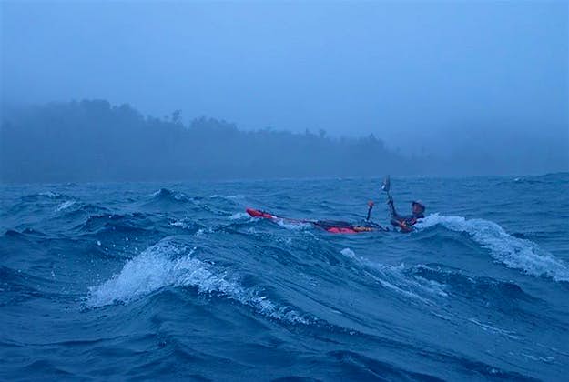 Travel News - paddling-on-rough-seas-in-west-papua-indonesia-photo-by-justine-curgenven Paddling in rough seas in West Papua, Indonesia.